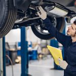 mechanic working on car